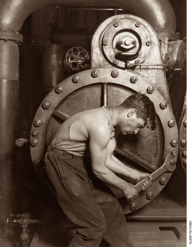 Man working on machinery in a factory