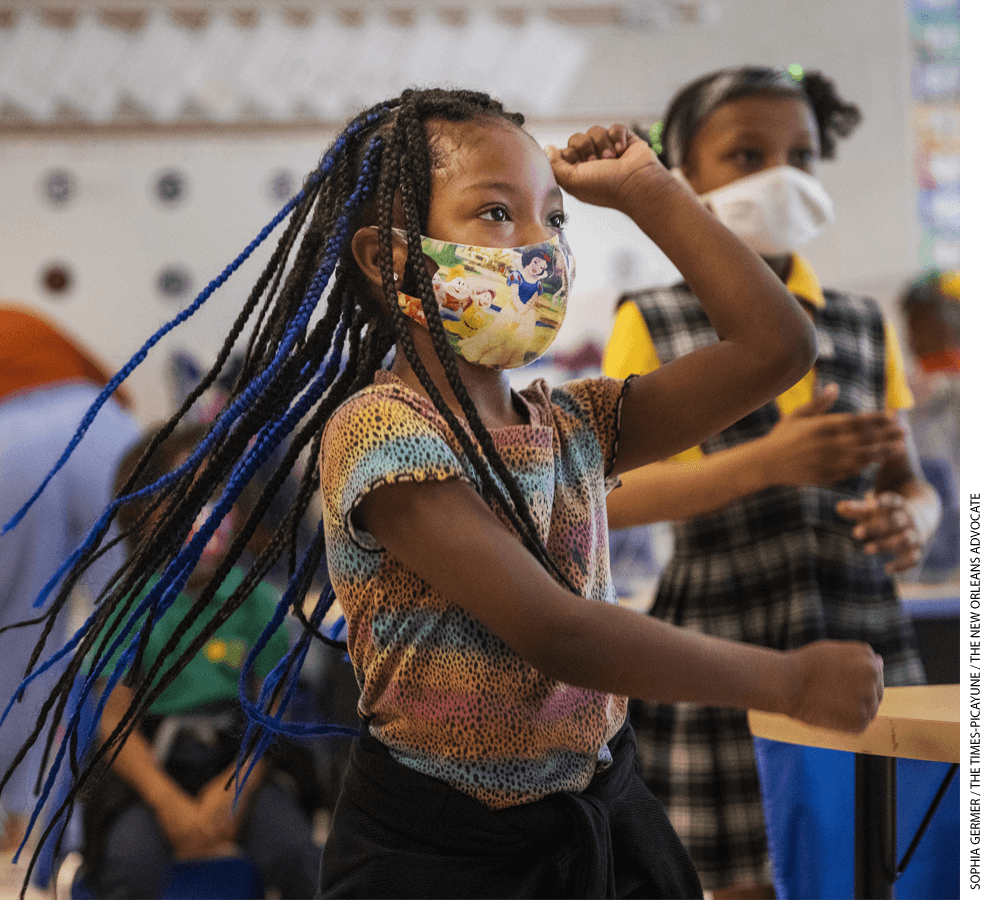 Denae Smith, 5 years old, dances with her 1st-grade classmates at KIPP East Community Primary, a charter school.