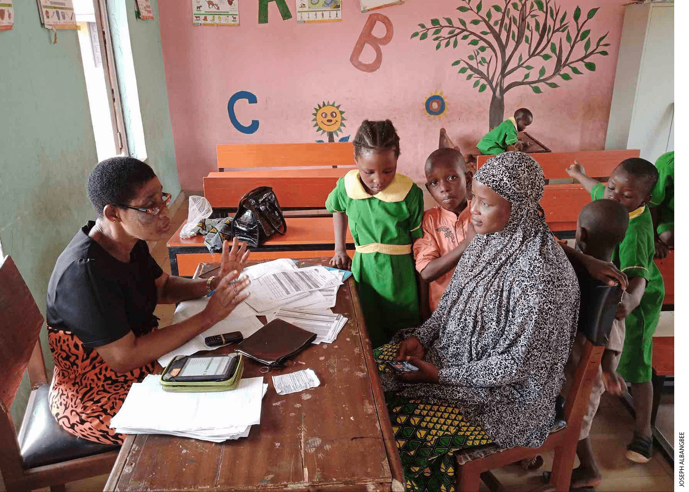 In Edo State, Nigeria, the field team examines a Bridge experiment aimed at transforming static parent-teacher conferences into back-and-forth conversations.